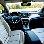 **

"The spacious interior of a Hyundai Ioniq 5, showcasing the legroom and flat floor. Modern design, sustainable materials visible, seats in a relaxed position. Bright, natural lighting. Safe for work, appropriate content, fully clothed interior, family-friendly, professional car photography, correct proportions, natural perspective."

**